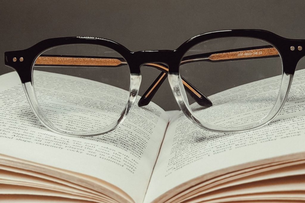 Glasses laying on a book
